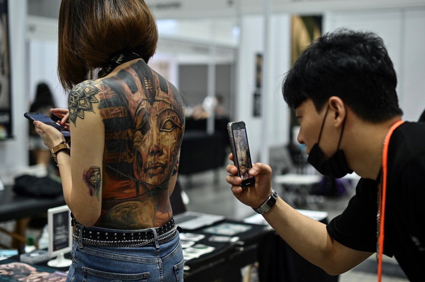 Malaysia orders inquiry over half-naked tattoo show - Lifestyle pic