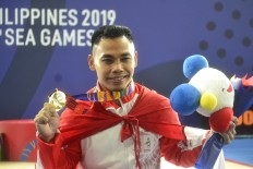 Veteran weightlifters determined to satisfy Olympics curiosity