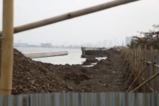 The National Capital Integrated Coastal Development (NCICD) coastal wall on the east side of the Nizam Zachman Port in Penjaringan, North Jakarta, on Dec. 6.