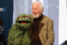 In this file photo taken on October 09, 2014 Caroll Spinney 'Oscar and Big Bird' attends SiriusXM's Town Hall with original cast members from Sesame Street commemorating the 45th anniversary of the celebrated series debut on public television moderated by Weekend TODAY co-anchor Erica Hill in New York City. 