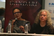 Questions and answers: Indonesian senior artist Christine Hakim talks during a press conference on a new play, 'Opera Gandari', in Jakarta.