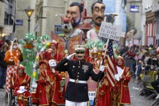 Performers take part in the 89th edition of the carnival parade in the streets of Aalst, near Brussels, on February 26, 2017.