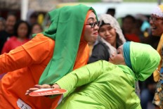 Nag-off: Jakartans compete at a favorite city pastime