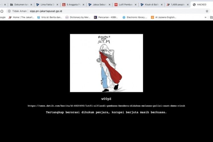 The hacked display on the Central Jakarta District Court's website on Thursday. The website, http://pn-jakartapusat.go.id/, was under maintenance on Friday.