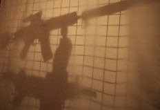 A soldier tries out an SS2 subsonic 5.66 assault rifle made by state-owned PT Pindad at the Defense Ministry building in Jakarta on June 9, 2016. Pindad has been acquired by state-owned PT LEN to form a new defense holding company.