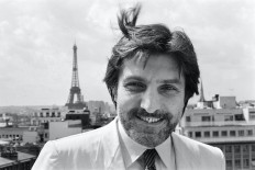 French designer Emanuel Ungaro poses on July 31, 1980 in Paris. French fashion designer Emanuel Ungaro, who described himself as a 'sensual obsessive', has died in Paris at the age of 86, his family told AFP on Dec. 22, 2019. Ungaro, who retired from fashion in 2004, died on Dec. 21 after two years in a 'weakened' state of health, a family member told AFP. He was born in southern France in 1933 to a family of Italian immigrants, and moved to Paris in 1956, where he was trained by Spanish designer Cristobal Balenciaga.
