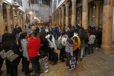 At Christmas, Bethlehem says denied full gifts of tourism