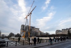 French architects want Notre-Dame roof rebuilt in wood