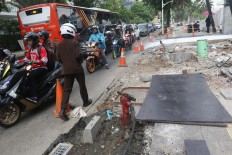 Jakarta confident it can book higher budgetary spending despite year-end approaching