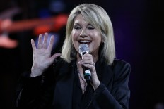 In this file photo taken on February 23, 2017 British-Australian singer Olivia Newton-John performs at the 58th Vina del Mar International Song Festival on February 23, 2017 in Vina del Mar, Chile. 
