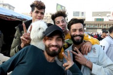 Pompadour and rooster cuts: Iraqi styles sculpt 'revolution'