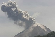 Central Java's Mount Merapi spews hot ash again