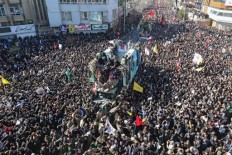 Iranians mass for funeral in hometown of general killed by US