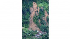 Nowhere to go: Houses are trapped under a landslide in Sukajaya, Bogor, West Java. Antara/Akbar Nugroho Gumay
