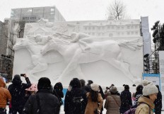 Oh, snow! Warm winter woes for famed Japan festival