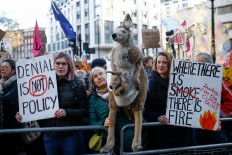 Climate change protests stretch to London as Australia bushfires rage