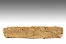 A large gold bar found decades ago in downtown Mexico City, part of the plunder Spanish conquerors fleeing the Aztec capital after native warriors forced a hasty retreat, is seen in this handout photograph released to Reuters by the National Institute of Anthropology and History (INAH) on January 9, 2020.  