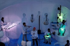 Musicians play instruments made from ice during a performance at the Ice Music Festival in an igloo at 2,600 meters above sea level on the Presena Glacier, in Passo Paradiso, Italy, on January 9, 2020. 
