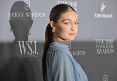 Gigi Hadid flaunts baby bump in high fashion maternity shoot