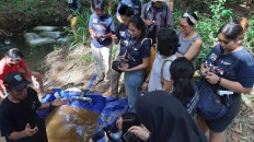 Studying history: Negeri Rempah Foundation volunteers visit Kacang Butor village in Belitung in Bangka-Belitung province, taking note of the great stories of pepper explained by a local farmer in Belitung, known as the main producer of pepper in the country.  