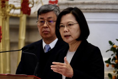 Taiwan President Tsai Ing-wen speaks during a press conference at the presidential office as Vice President Chen Chien-jen looks on in Taipei on January 22, 2020. (Photo by Sam Yeh / AFP)