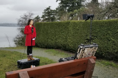 Amelia Brace, the North America correspondent for Australia's Channel 7, gives a live report in North Saanich, Vancouver Island, British Columbia on January 21, 2020. 