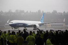 Lurching from crisis to crisis, Boeing delays 777X with demand hobbled