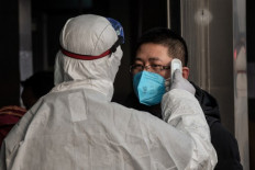 Confusion as WHO corrects China virus global risk level