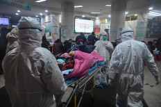 China virus death toll jumps to 106, nearly 1,300 new cases
