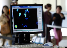 Beijing orders quarantine for foreign arrivals from virus-hit areas