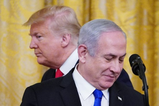 US President Donald Trump and Israel's Prime Minister Benjamin Netanyahu take part in an announcement of Trump's Middle East peace plan in the East Room of the White House in Washington, DC on Jan. 28, 2020. Trump declared that Israel was taking a 
