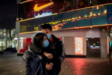 China battles virus spread with masks and disinfectant