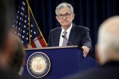 Fed's Powell says too soon to gauge vaccine impact