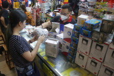 A mask seller offers various kind of mask at Lindeteves Trade Center (LTC) in Glodok, Jakarta, on Jan. 28. 