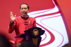 Jokowi wears traditional Chinese attire for New Year celebration