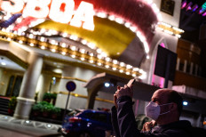 Macau casinos to reopen after virus ban lifted