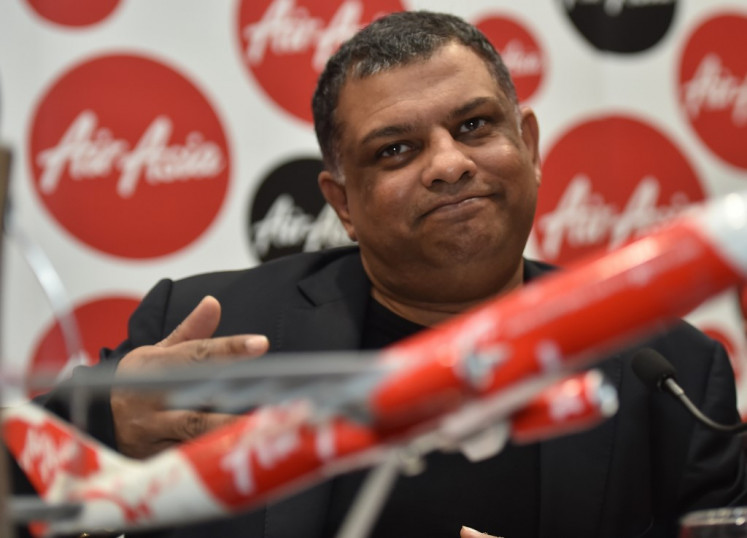 AirAsia Group CEO, Tony Fernandes speaks at a press conference in Sydney on March 12, 2015. Fernandes said he was not giving up on finding bodies from one of  the airline's jets that crashed in the Java Sea on December 28, 2014 but flagged the hunt will draw to a close within weeks. 