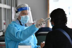Hong Kong reports first death of coronavirus patient