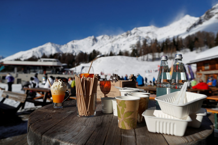 Glass bottles, paper straws and other items made of sustainable materials are displayed in the 'plastic free zone' of Pejo 3000, the first ski resort in Italy to ban single-use plastic, in Peio, Trentino, Italy, on Jan. 30, 2020.