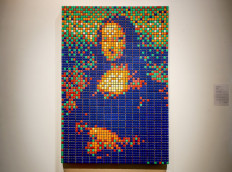 The street art Rubik's Cube version of the 'Mona Lisa' entitled 'Rubik Mona Lisa' made in 2005 by French artist Invader is on display at the Artcurial auction house in Paris on February 3, 2020 before being auctioned next February 23rd. 