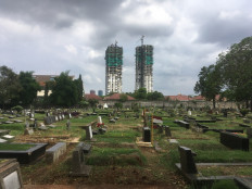 Rest in peace: The solemn and quiet Jeruk Purut Cemetery is well-known as one of the most haunted spots in Jakarta.