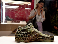 A visitor views a sculpture during the exhibition 'Worn by the Gods' at the Fashion and Costume Museum in Palazzo Pitti in Florence on January 30, 2020.  