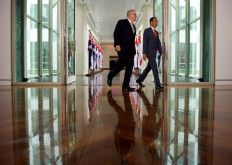 Australia's Prime Minister Scott Morrison (L) walks with Indonesian President Joko Widodo (R) as they leave the House of Representatives at Parliament House in Canberra on February 10, 2020.
