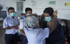 Surabaya Mayor Risma admits to hoarding masks 'since January' in anticipation of COVID-19 outbreak