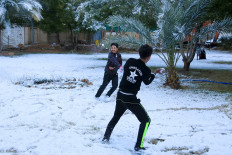 Ultra-rare snowfall carpets Baghdad