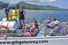 Bali quarantines nine foreign tourists who sat next to NZ COVID-19 patient in airplane