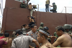 Twenty inmates named suspects in North Sumatra prison riot