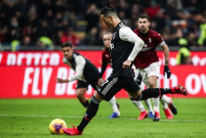 Ronaldo penalty snatches Juventus first-leg draw at Milan