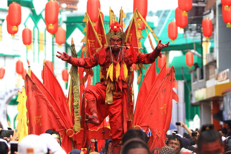 Tatung parade brings supernatural nuance to Cap Go Meh celebration