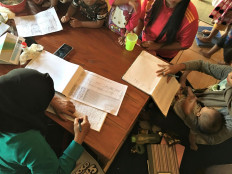 Collaboration: Volunteer health workers take part in a training session to learn about stunting.